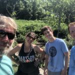 Volunteers Ilena, Connor & Tom Dempsey work alongside Babylon Creek Defender Todd Shaw.